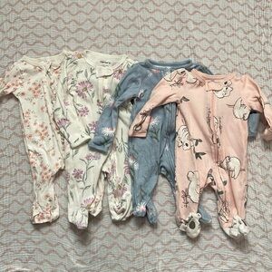 4 newborn footie jammies